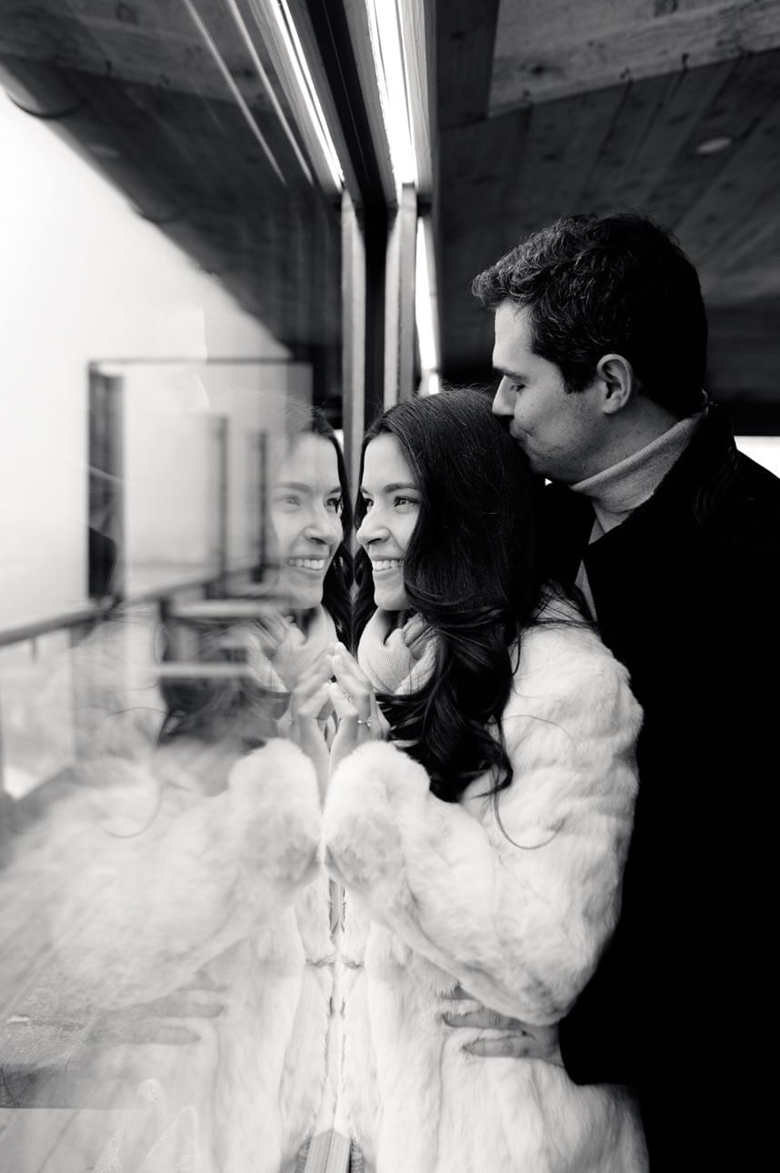 Andrea and Diego looking out a window